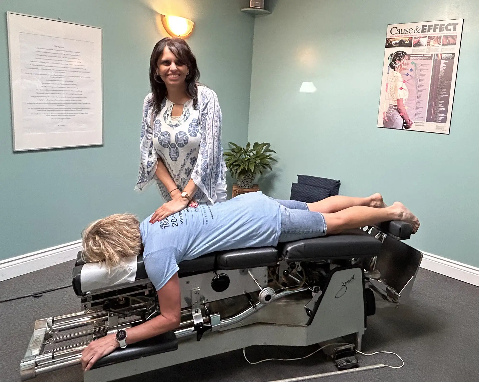 Chiropractor Toronto ON Salima Manji Adjusting Patients Back